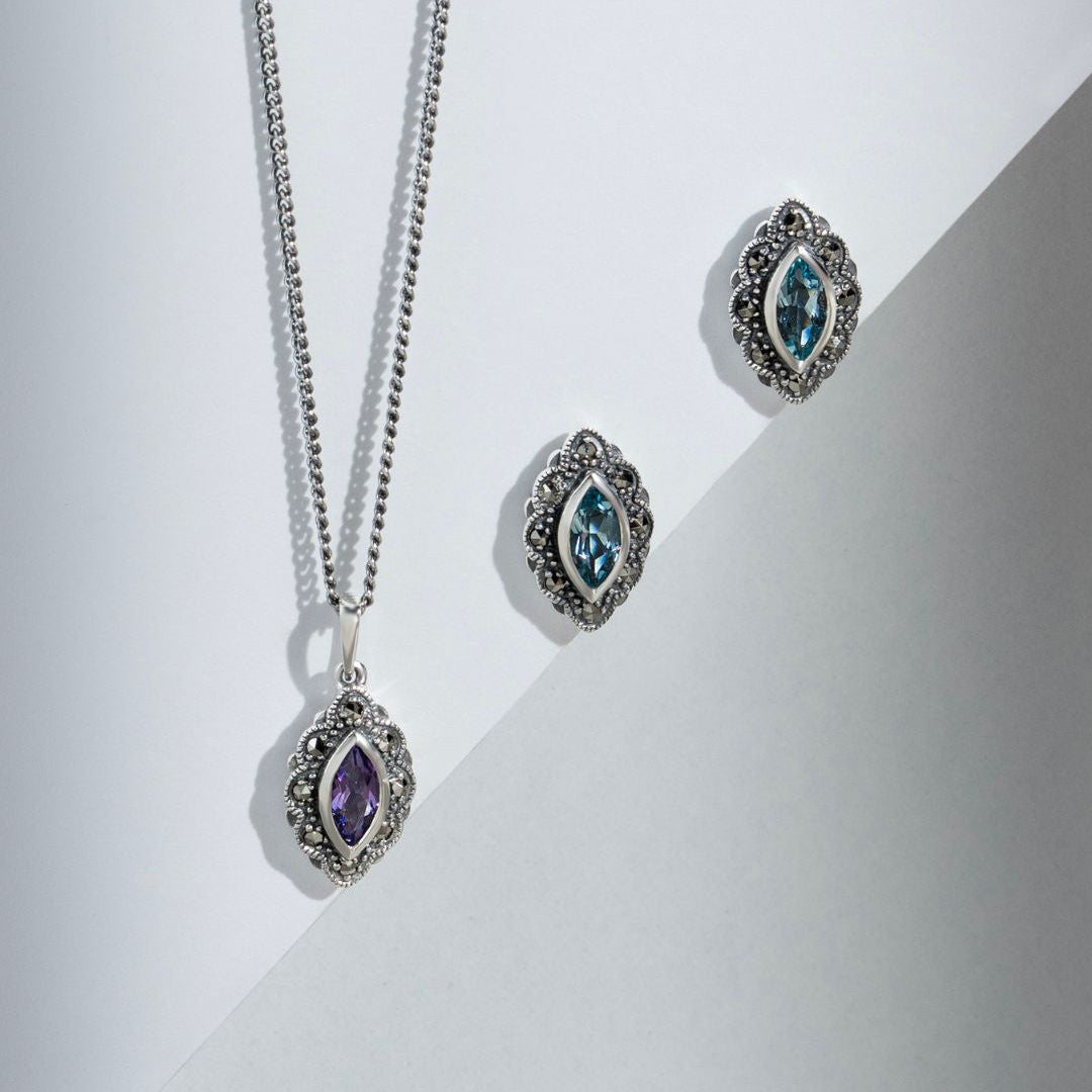Aretes estilo art nouveau con topacio azul marquesita y marcasita en plata de ley 925
