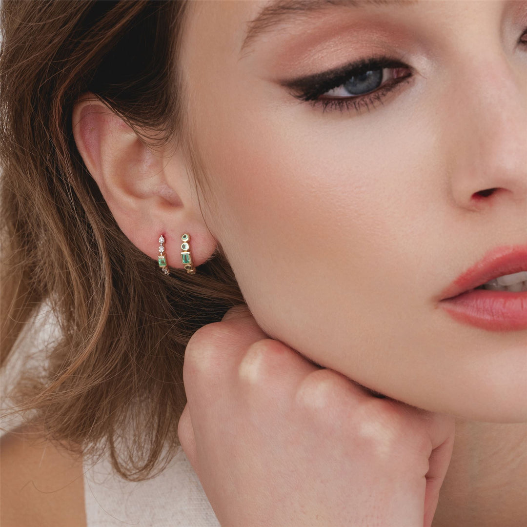 classic-baguette-emerald-diamond-half-eternity-hoop-earrings-in-9ct-yellow-gold-135e1886019 on Model