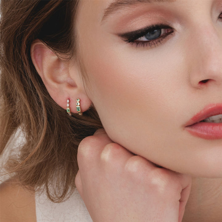 classic-baguette-emerald-diamond-half-eternity-hoop-earrings-in-9ct-yellow-gold-135e1886019 on Model