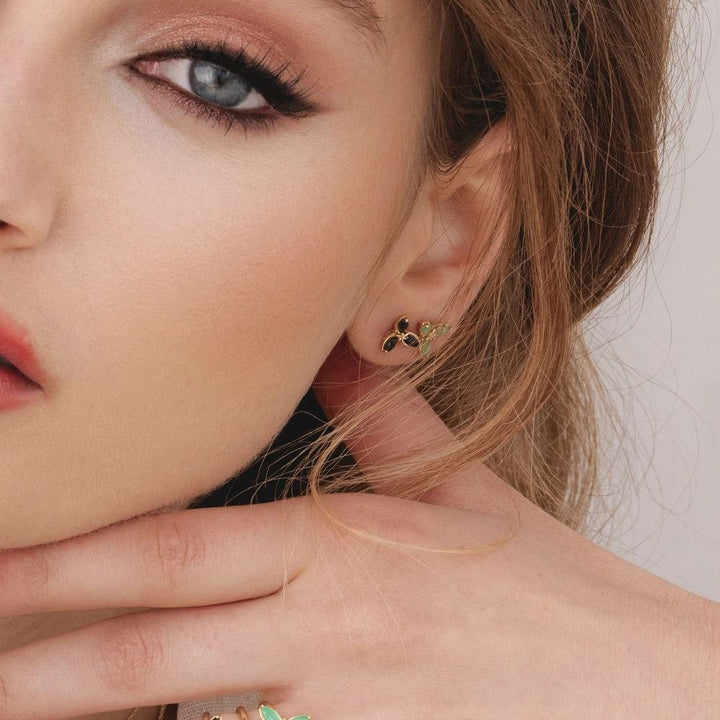 floral-marquise-emerald-stud-earrings-in-9ct-yellow-gold-132e2931039 on Model