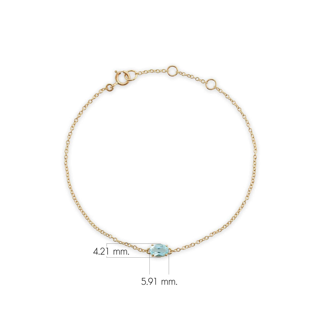 Brazalete clásico de topacio azul ovalado con una sola piedra en oro amarillo de 9 quilates