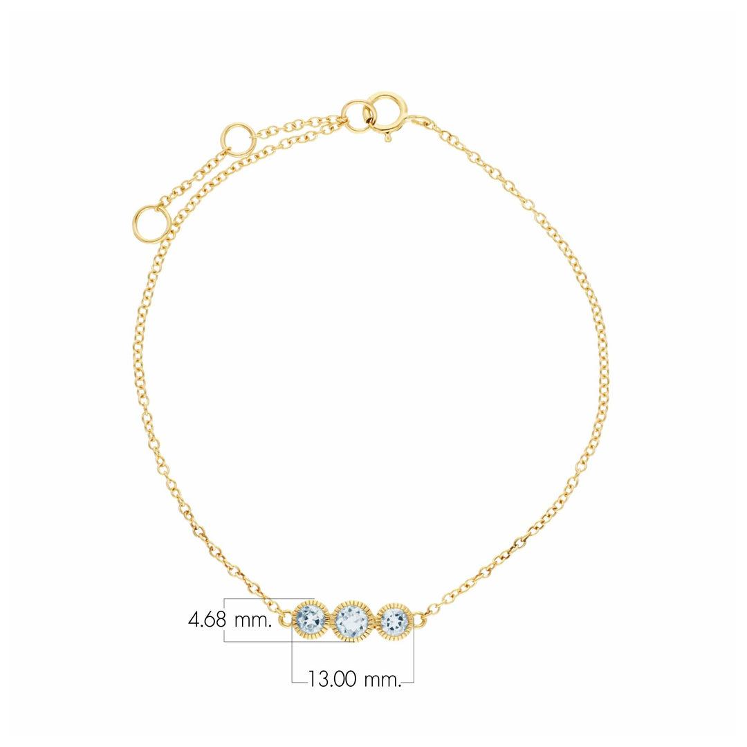 Brazalete redondo clásico con milgrain de tres piedras y aguamarina en oro amarillo de 9 quilates