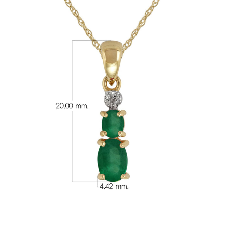 Colgante clásico de dos esmeraldas ovaladas y diamantes en oro amarillo de 9 quilates