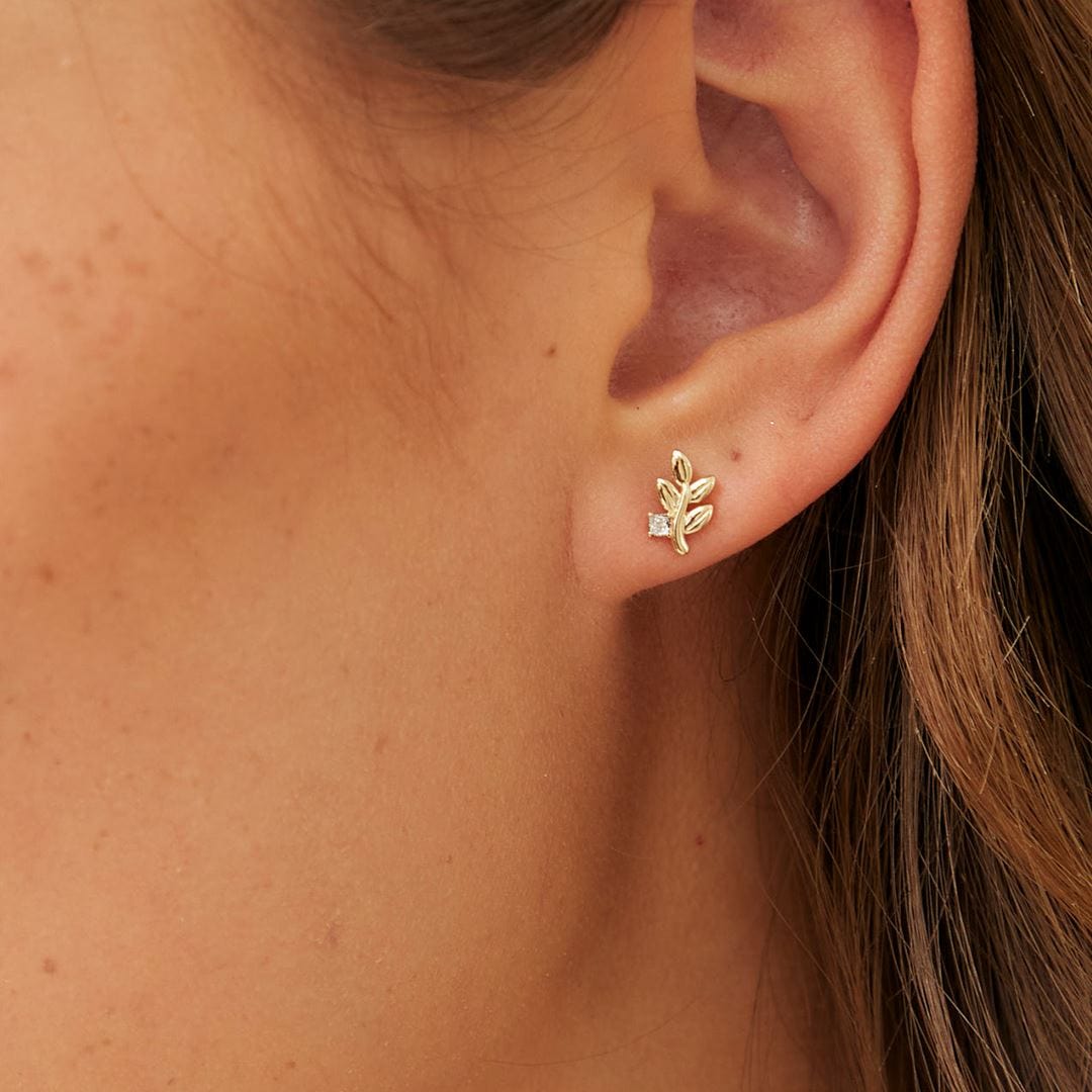191E0436019 O leaf Diamond Stud Earrings In 9ct Yellow Gold On Model