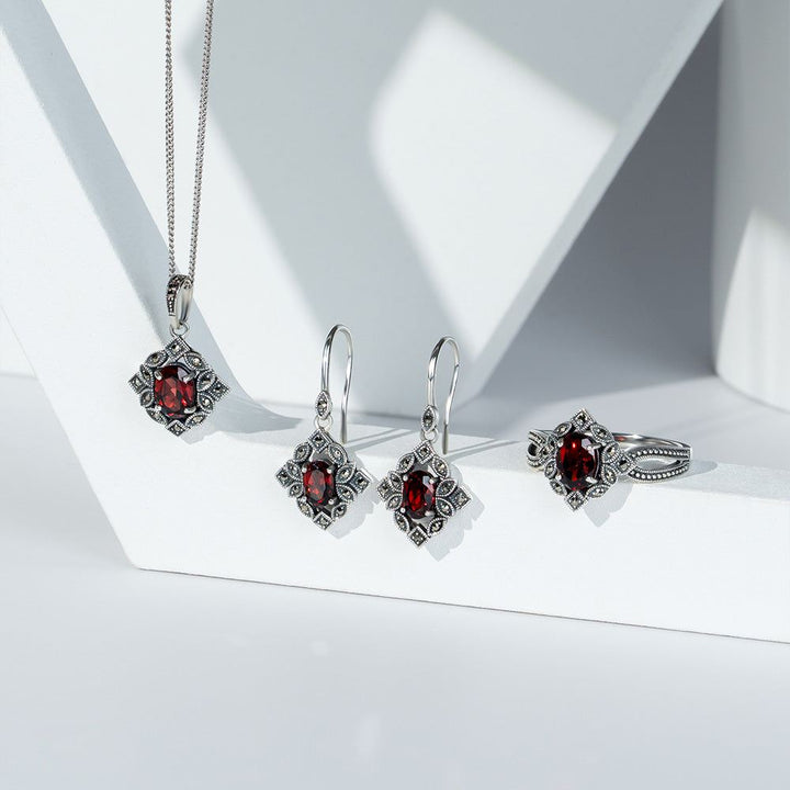 Pendientes colgantes ovalados de granate y marcasita estilo art déco en plata de ley