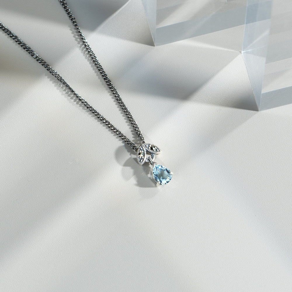 Art Nouveau Style Pear Aquamarine & Marcasite Pendant in 925 Sterling Silver flatlay