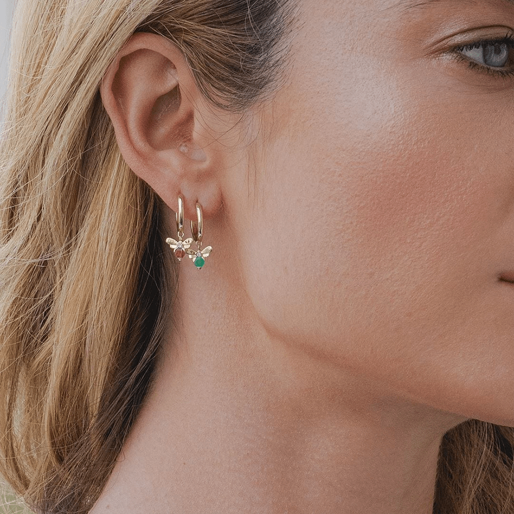 Honeycomb Inspired Emerald and Diamond Bee Hoop Earrings in 9ct Yellow Gold On Model  135E1874029